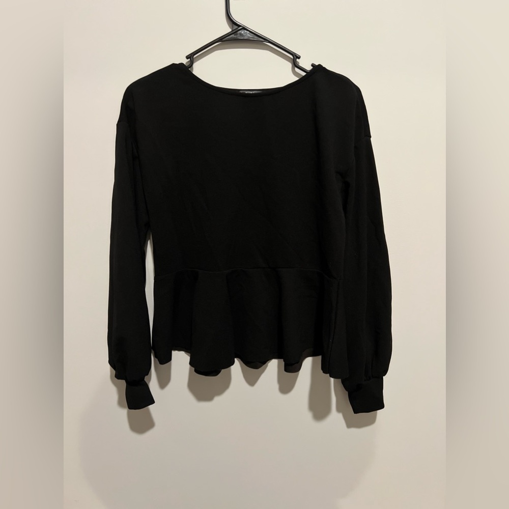 Black, long sleeve shirt with flare